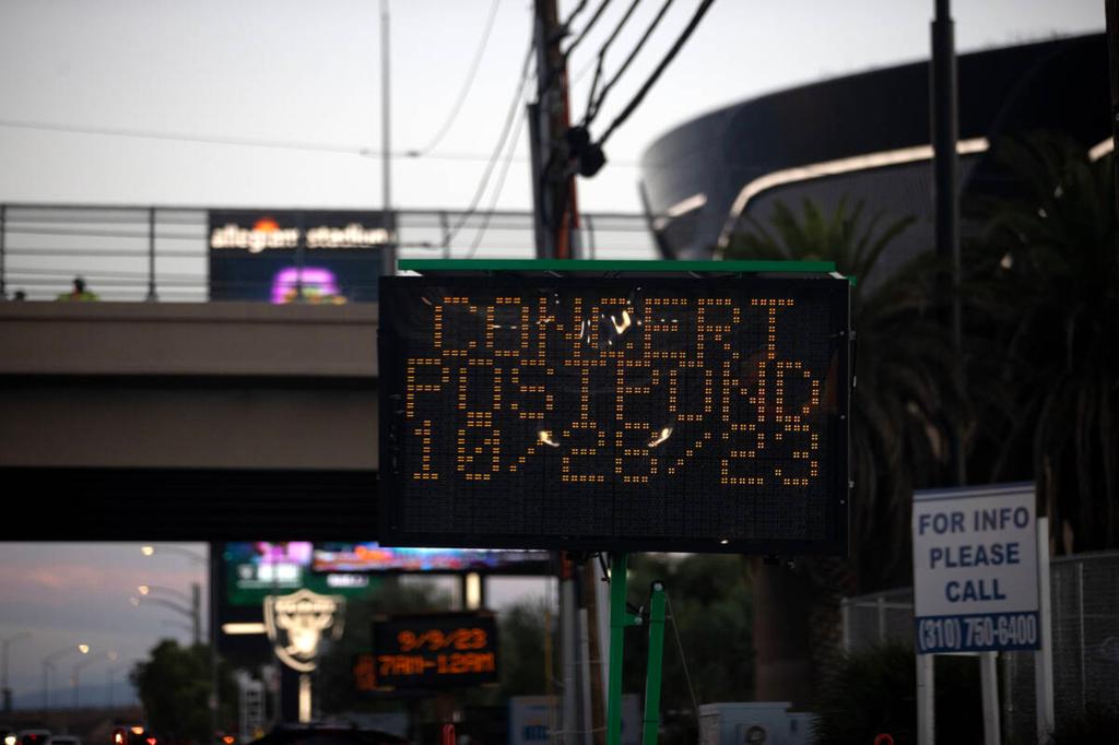 A sign notes the new date for Ed Sheeran's concert after he postponed his Allegiant Stadium show on Sep. 9, 2023, in Las Vegas. 