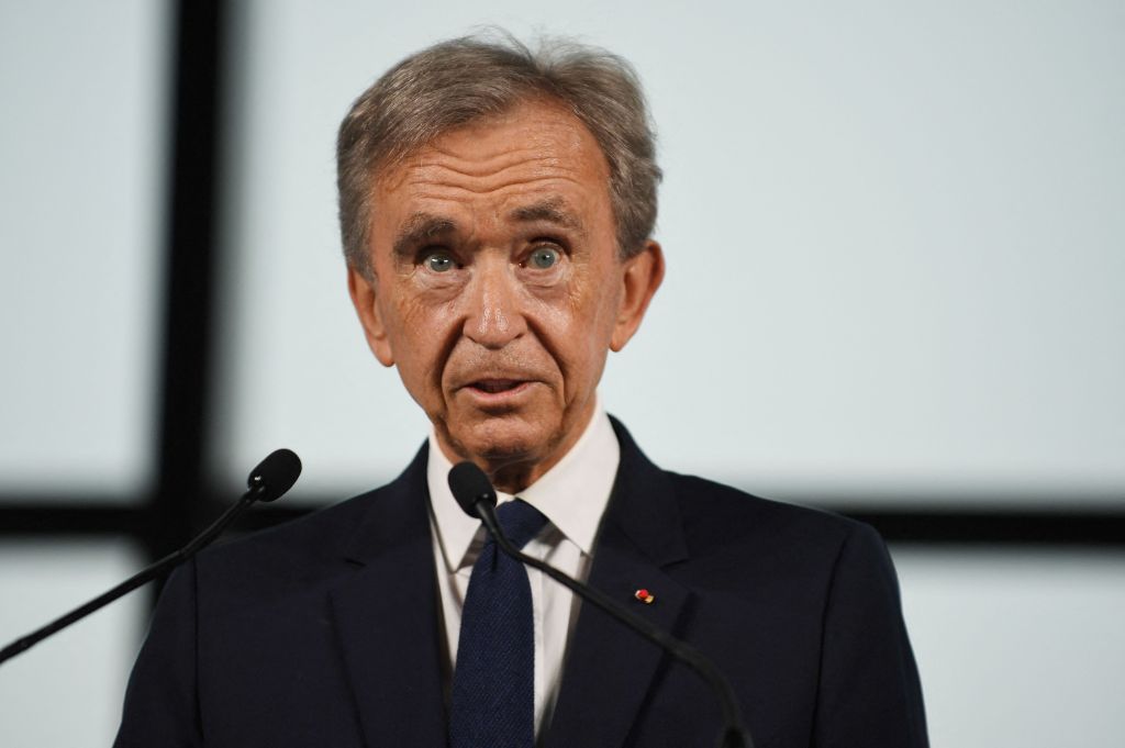 World's top luxury group LVMH head Bernard Arnault delivers a speech during a meeting after LVMH was named as final premium sponsor of 2024 Paris Olympics, in Paris on July 24, 2023. LVMH group announced on July 24, 2023, that it was the sixth premium partner for the Paris 2024 Olympic Games, allowing the comittee to almost reach their objective of 1.24 billion euros in partnerships. (Photo by JULIEN DE ROSA / AFP) (Photo by JULIEN DE ROSA/AFP via Getty Images)
FRANCE-LUXURY-LVMH-OLY-2024