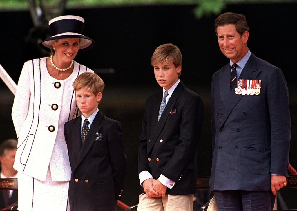 Princess Diana is seen with Harry, William and Charles in 1994. 