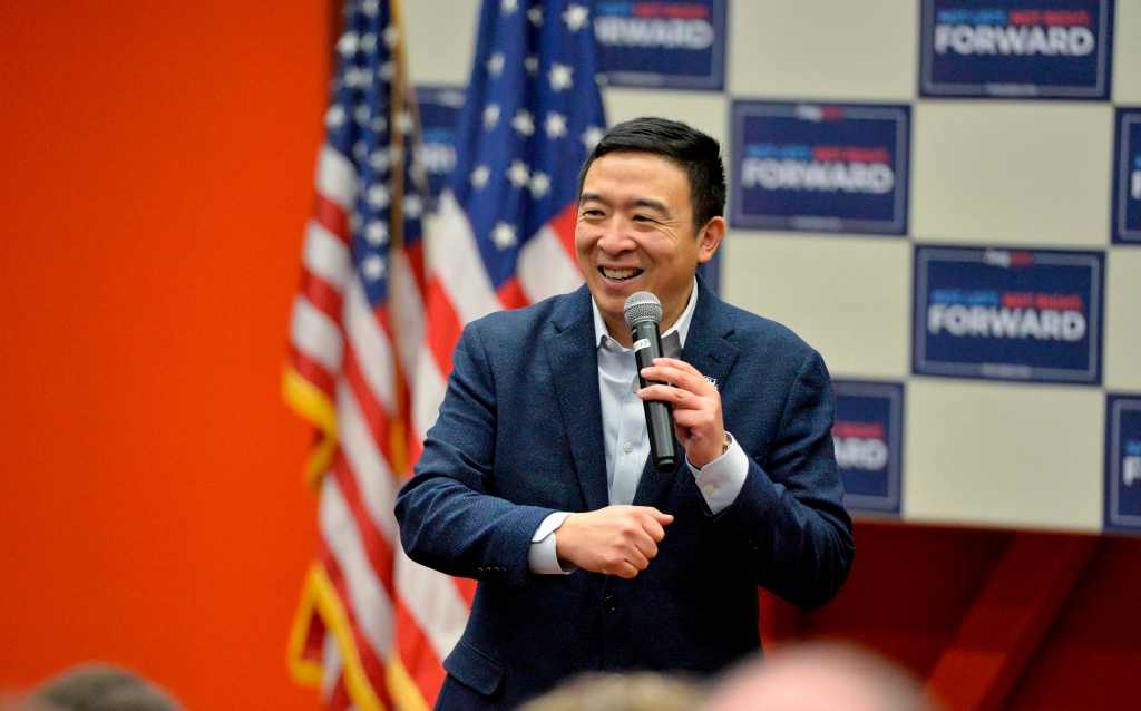 US Presidential Candidate Andrew Yang speaks to a packed room during a town hall event at Lakes Region Community College in Laconia, New Hampshire on February 4, 2020. - The US Democratic Party was unable to provide results from the Iowa state caucuses Tuesday despite spending millions of dollars, owing to what it called a technical glitch and President Donald Trump called incompetence.New Hampshire votes second, on February 11,2020 and tradition dictates that the top performers in Iowa board jets and race to The Granite State to capitalize on the momentum. (Photo by Joseph Prezioso / AFP) (Photo by JOSEPH PREZIOSO/AFP via Getty Images)