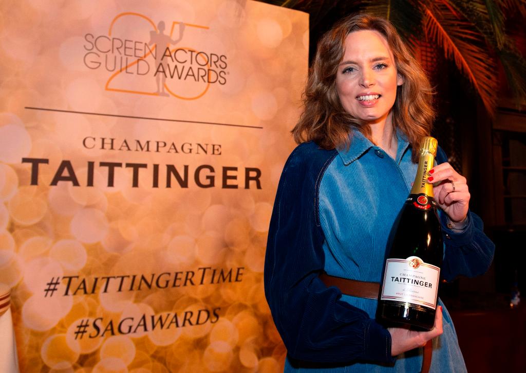 Vitalie Taittinger is pictured with a bottle of the champagne at the SAG Awards in 2019.