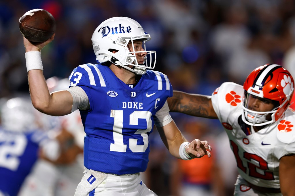 Riley Leonard throws the football.