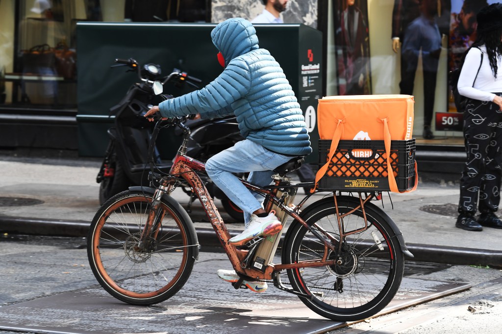 Devliery driver on a bike