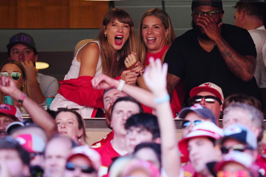 Taylor Swift watches from a suite inside Arrowhead Stadium.