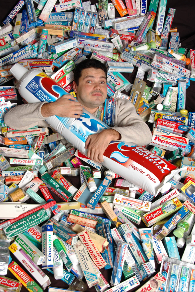 Val Kolpakov is pictured with some of his toothpaste collection. 