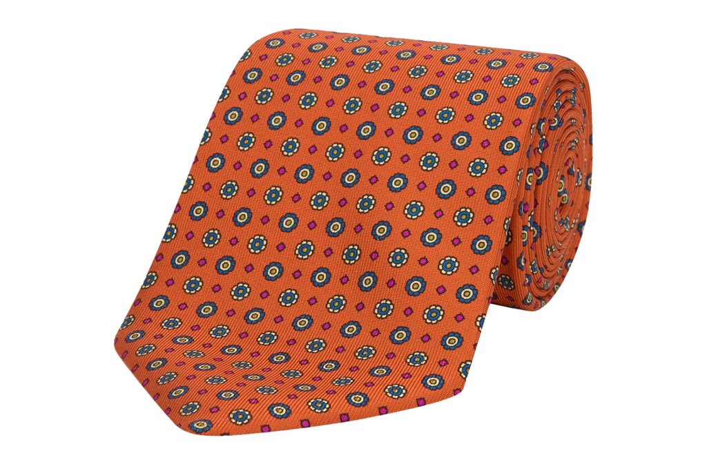 Orange and green paisley printed silk men's tie.