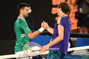 Novak Djokovic of Serbia and Taylor Fritz