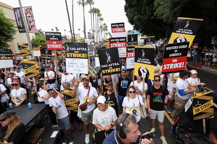 SAG-AFTRA actors and Writers Guild of America writers holding a rally in Los Angeles on September 13, 2023 amid their ongoing strikes.
