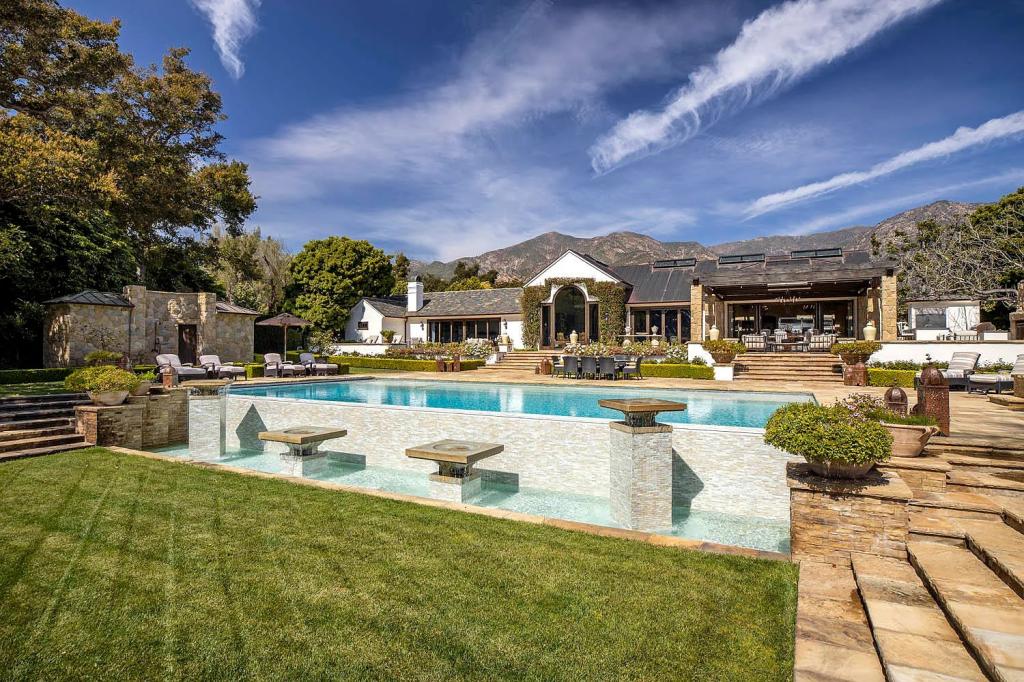 The estate spans over 9,100 square feet and holds 8 bedrooms. 