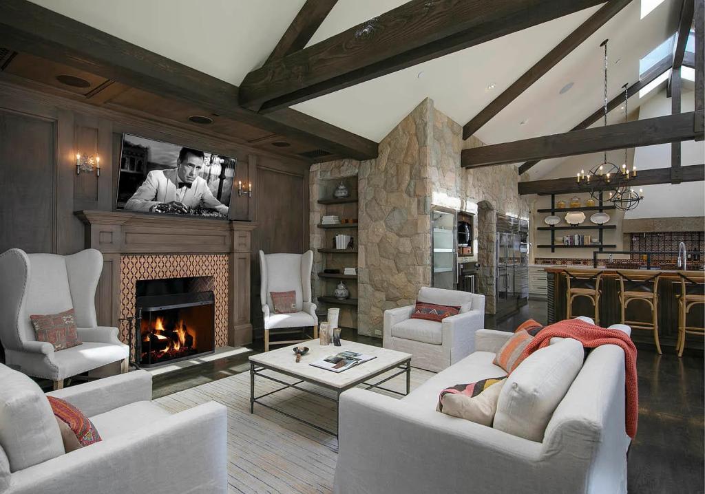 The formal living with a wood-burning fireplace. 