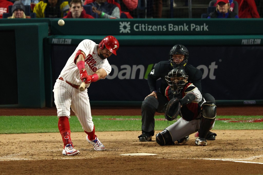 Kyle Schwarber #12 of the Philadelphia Phillies hits a sixth inning solo home run