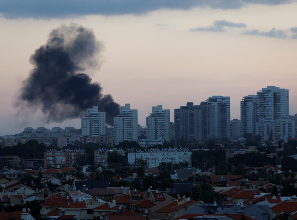 Smoke rises after rockets were launched from the Gaza Strip, in Ashkelon, Israel October 7, 2023.