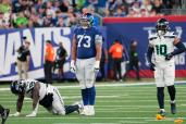 Evan Neal reacts after the Giants were called for a penalty in the fourth quarter of their 24-3 loss to the Seahawks.