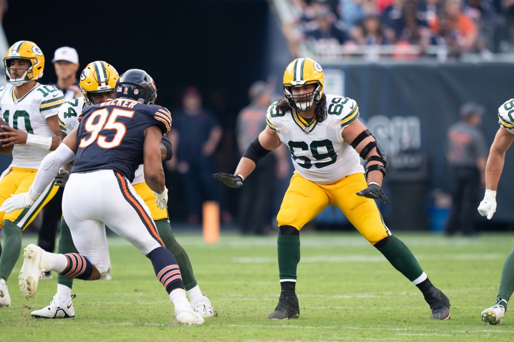 Offensive Tackle David Bakhtiari looks to make a block during an NFL football game against the Chicago Bear at Soldier Field.