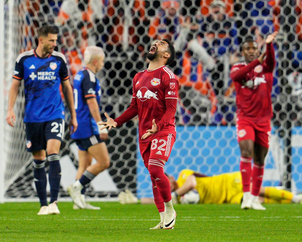 Luquinhas (82) of New York Red Bulls reacts after having his shot saved by Roman Celentano (18) of FC Cincinnati.