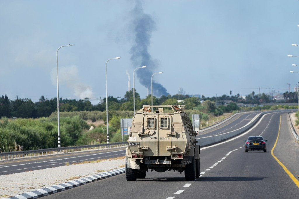 Palestinian militants in the Gaza Strip infiltrated Saturday into southern Israel and fired thousands of rockets into the country while Israel began striking targets in Gaza in response.