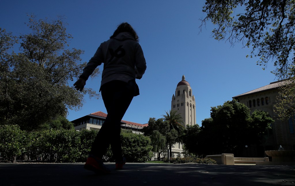 Hoover Tower is shown at rear on the campus of Stanford University