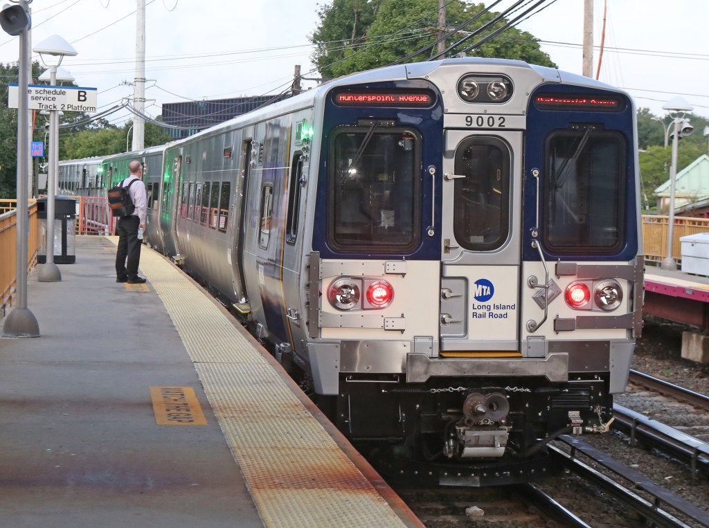 A train Leaving Huntington Train Station.