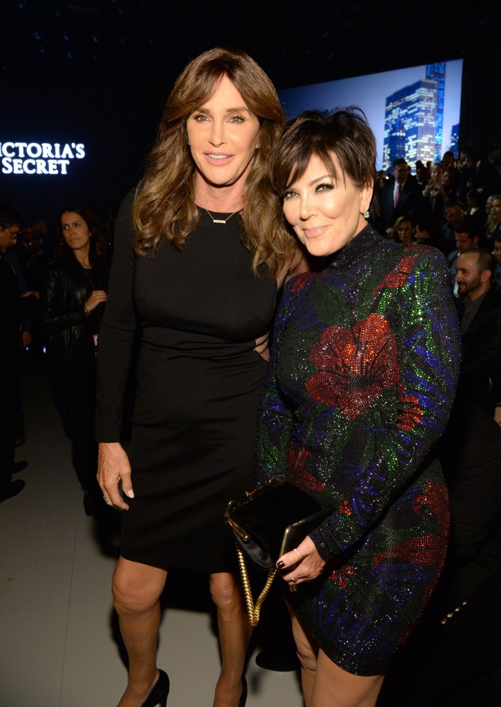 Caitlyn and Kris Jenner smiling together. 