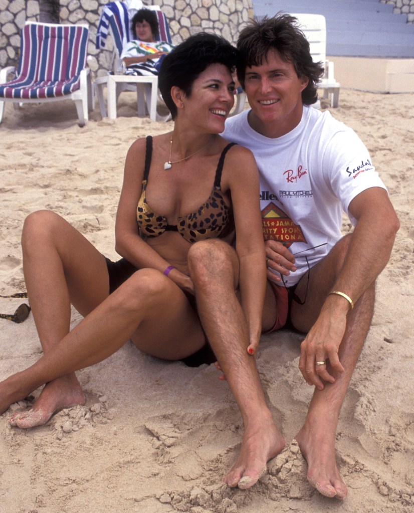 Bruce Jenner cuddling with Kris on a beach. 