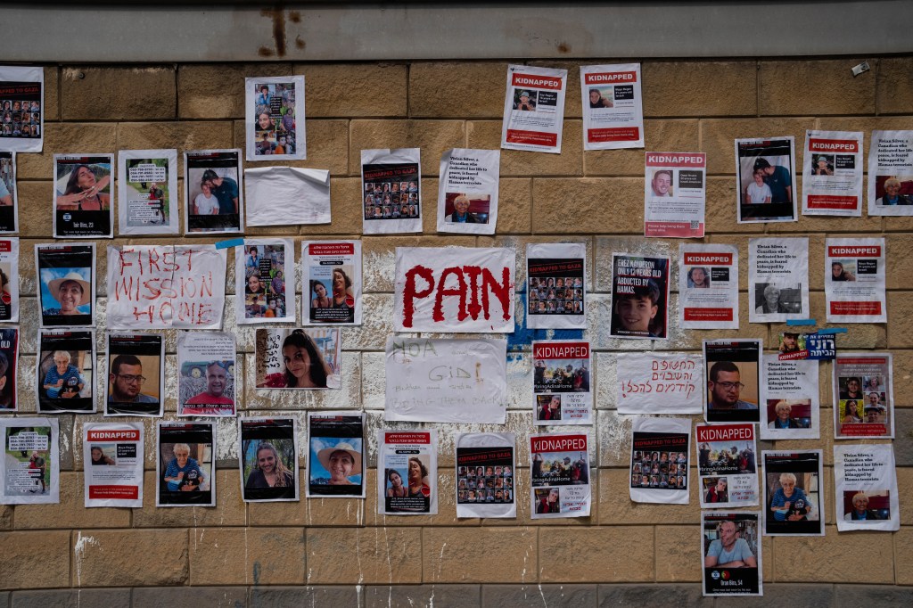 Posters in Tel Aviv of Israelis who are missing or being held captive by Hamas in Gaza.