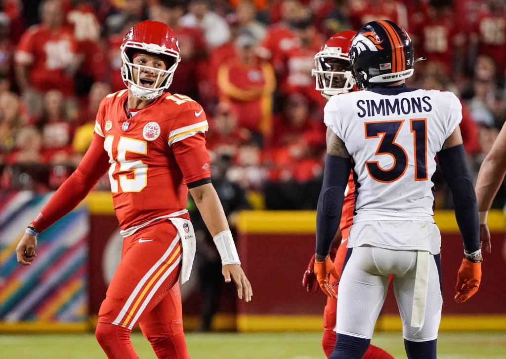 Patrick Mahomes has words with the Broncos' Justin Simmons during the Chiefs' win.