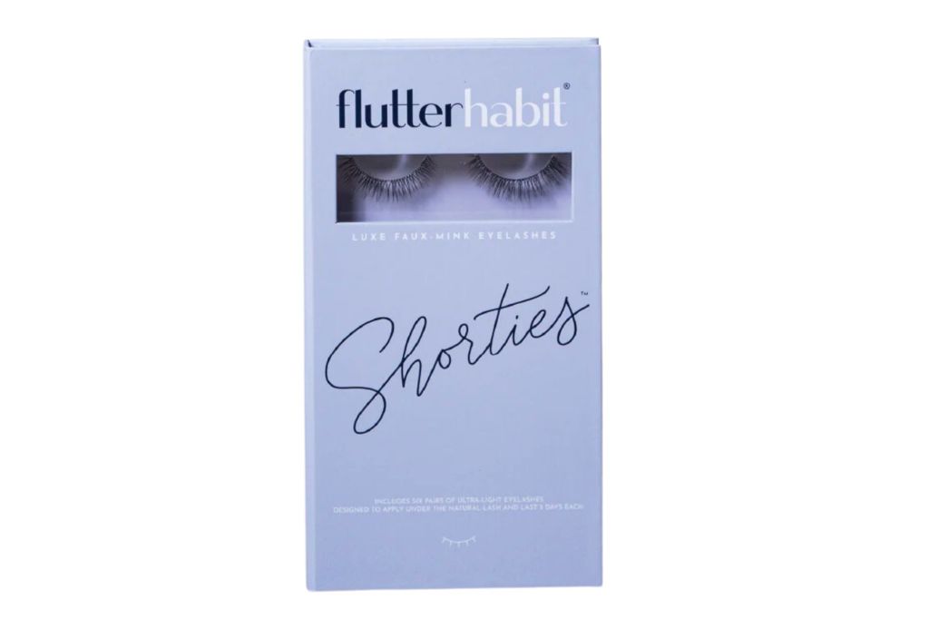 A pack of false eye lashes in a purple box with the word Shorties on the front.