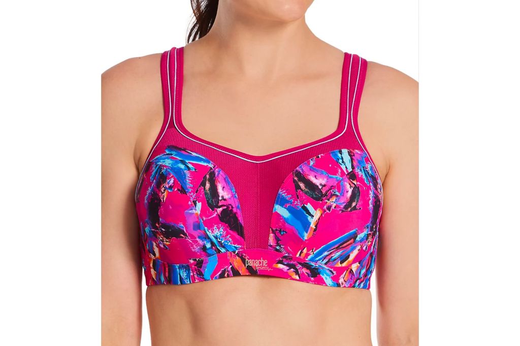 A model with a multicolored sports bra on.