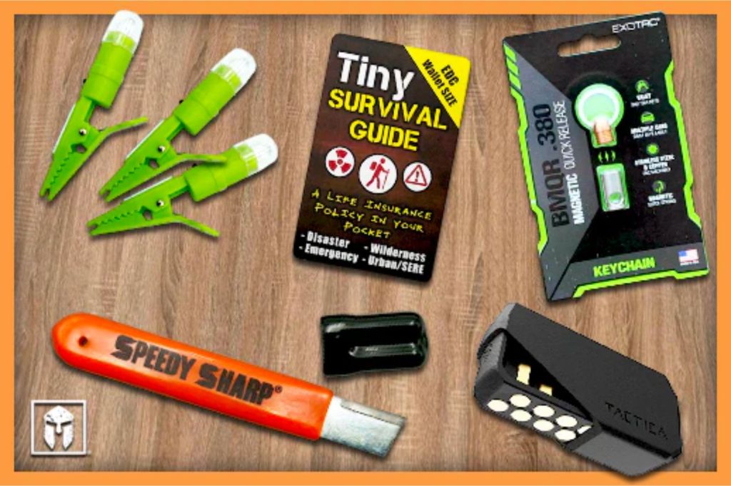 Several pieces of survival gear part of a survival kit.