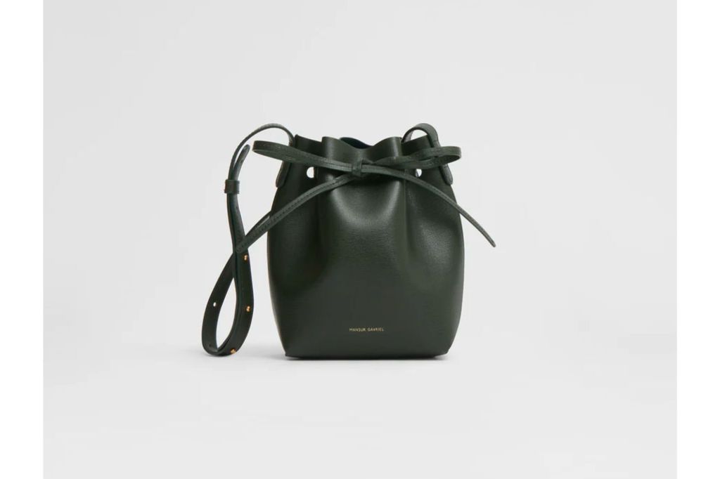 A dark green bucket bag