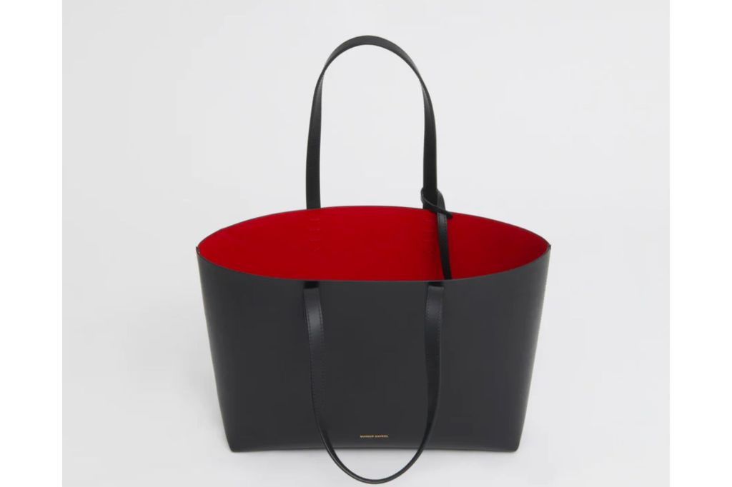 A black tote with red lining.