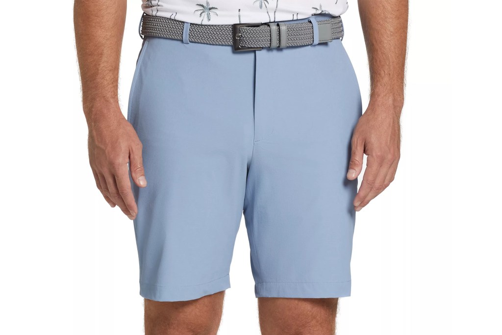 Man wearing golf shorts