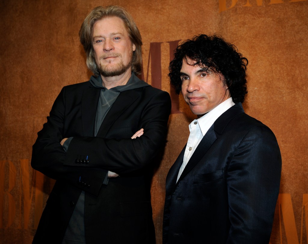 FILE - In this May 20, 2008 file photo, Daryl Hall, left, and John Oates pose before the 56th annual BMI Pop Awards in Beverly Hills, Calif. Hall and Oates will be inducted into the 2014 Rock and Roll Hall of Fame on April 10 at the Barclays Center in New York. (AP Photo/Chris Pizzello, File)