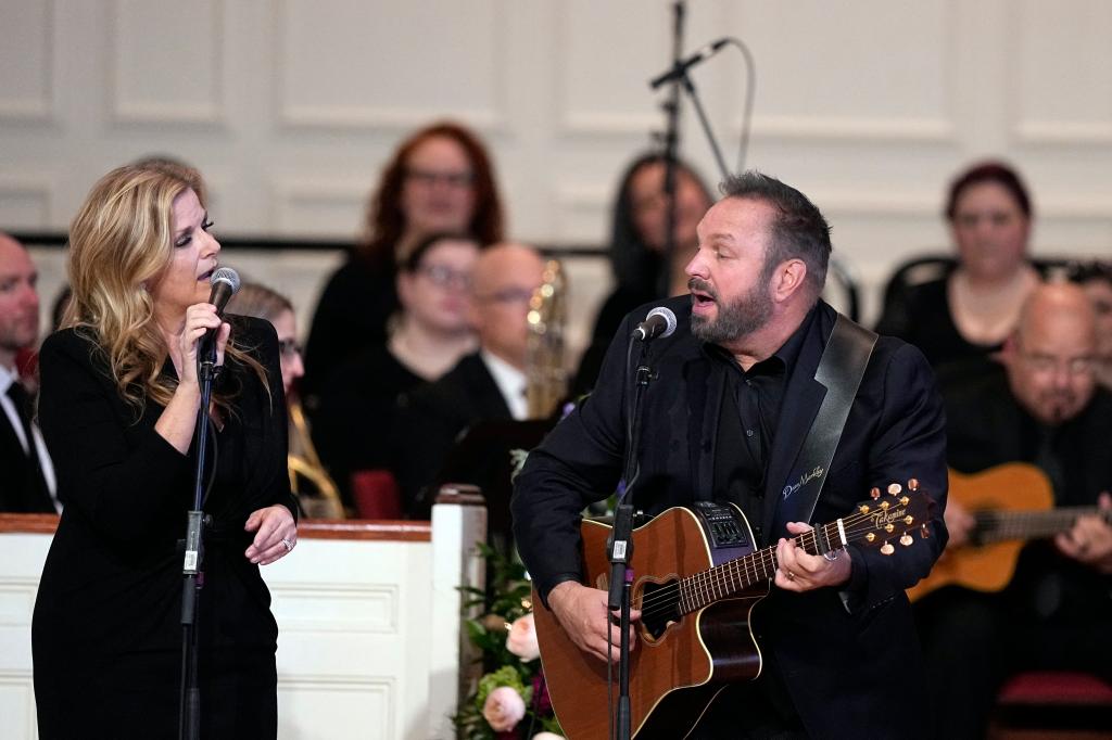 Garth Brooks and Trisha Yearwood perform "Imagine" at a tribute service for former US first lady Rosalynn Carter at Glenn Memorial Church at Emory University on November 28, 2023 in Atlanta.