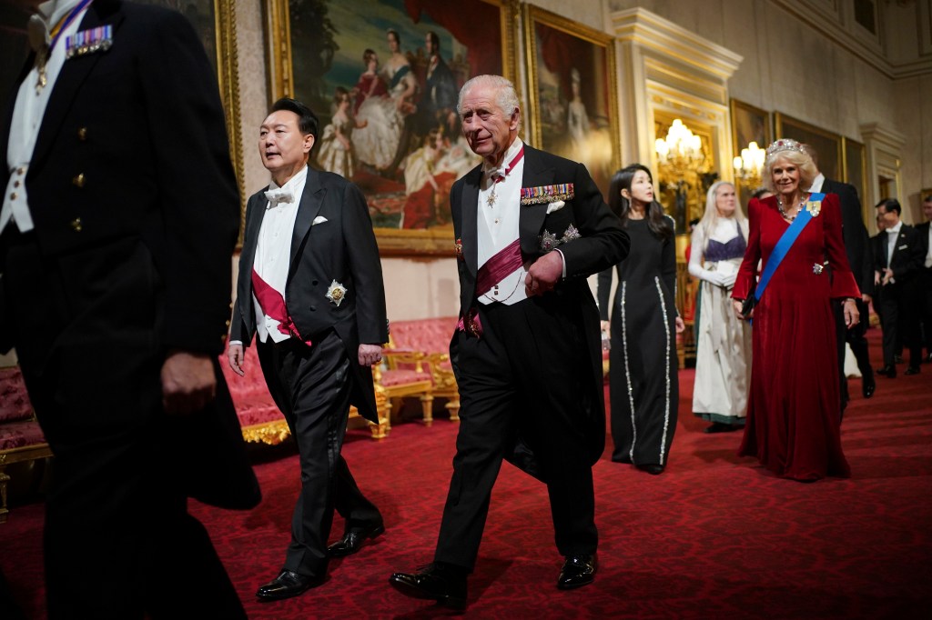 Britain's King Charles III with President of South Korea Yoon Suk Yeol ahead of the State Banquet for the state visit to the UK by President of South Korea Yoon Suk Yeol and his wife Kim Keon Hee at Buckingham Palace, London, Tuesday, Nov. 21, 2023. (Yui Mok/Pool Photo via AP)