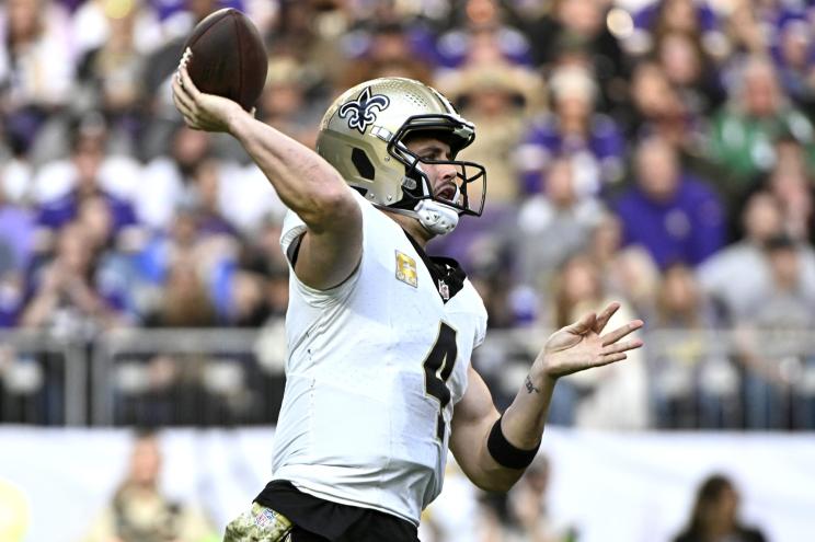 Derek Carr #4 of the New Orleans Saints throws a pass against the Minnesota Vikings.