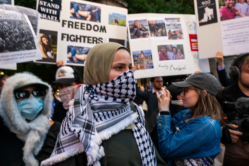 Supporters of both Israel and Palestine engage with each other at Columbia University on October 12, 2023 in New York City