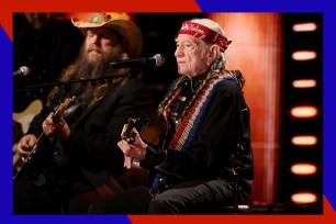 Willie Nelson sings and plays guitar onstage.
