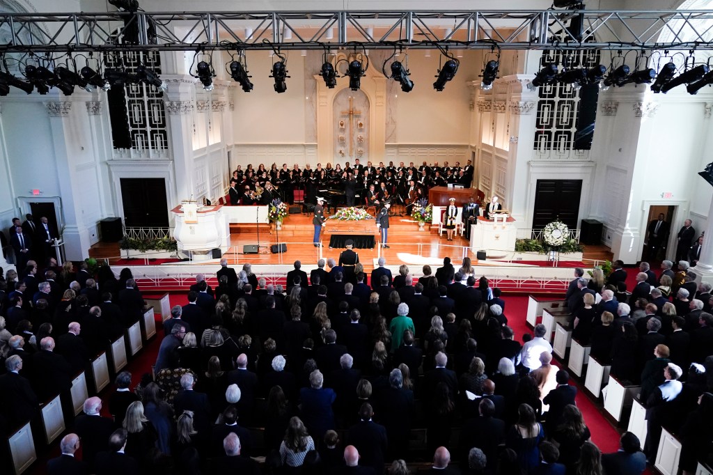 The casket of former first lady Rosalynn Carter, arrives inside Glenn Memorial Church, Tuesday, Nov. 28, 2023, in Atlanta.