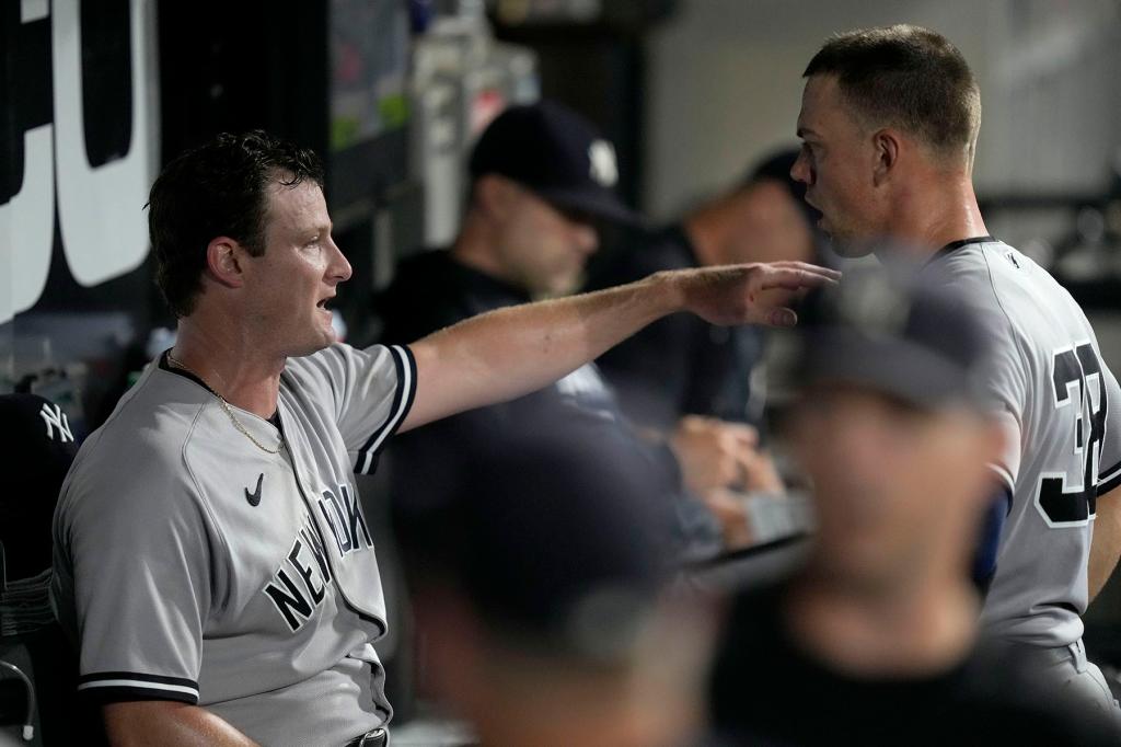 New York Yankees starting pitcher Gerrit Cole, left, talks with catcher Ben Rortvedt in the dugout after the fourth inning of a baseball game against the Chicago White Sox Monday, Aug. 7, 2023, in Chicago.