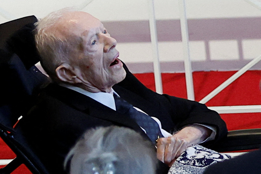 Former U.S. President Jimmy Carter attends a tribute service for his wife former first lady Rosalynn Carter, at Glenn Memorial Church in Atlanta, Georgia, U.S., November 28, 2023. 