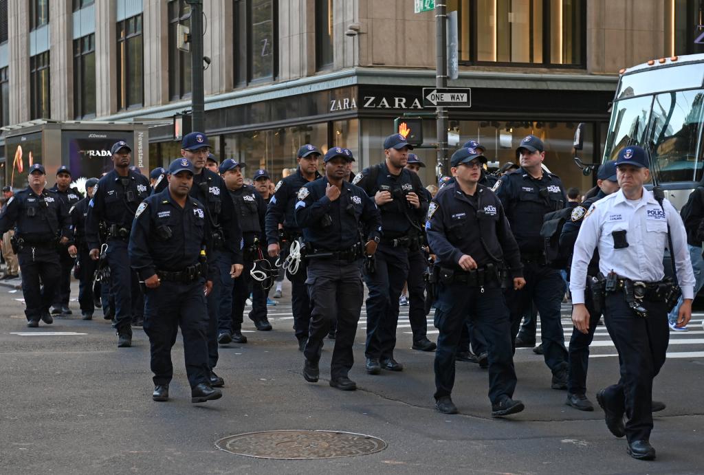 Police walk through Manhattan