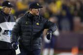 jim harbaugh michigan sign stealing suspension