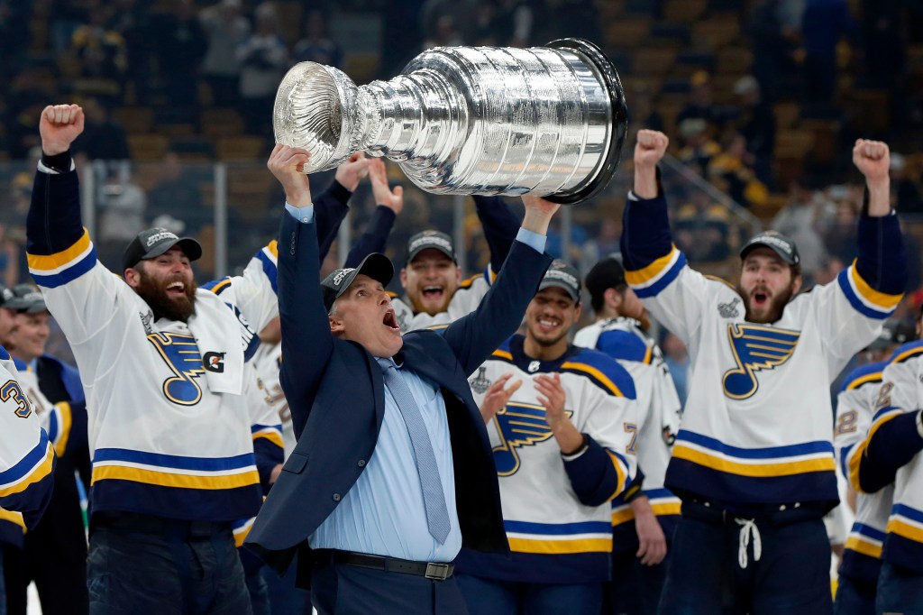 Craig Berube hoists the Stanley Cup in 2019.