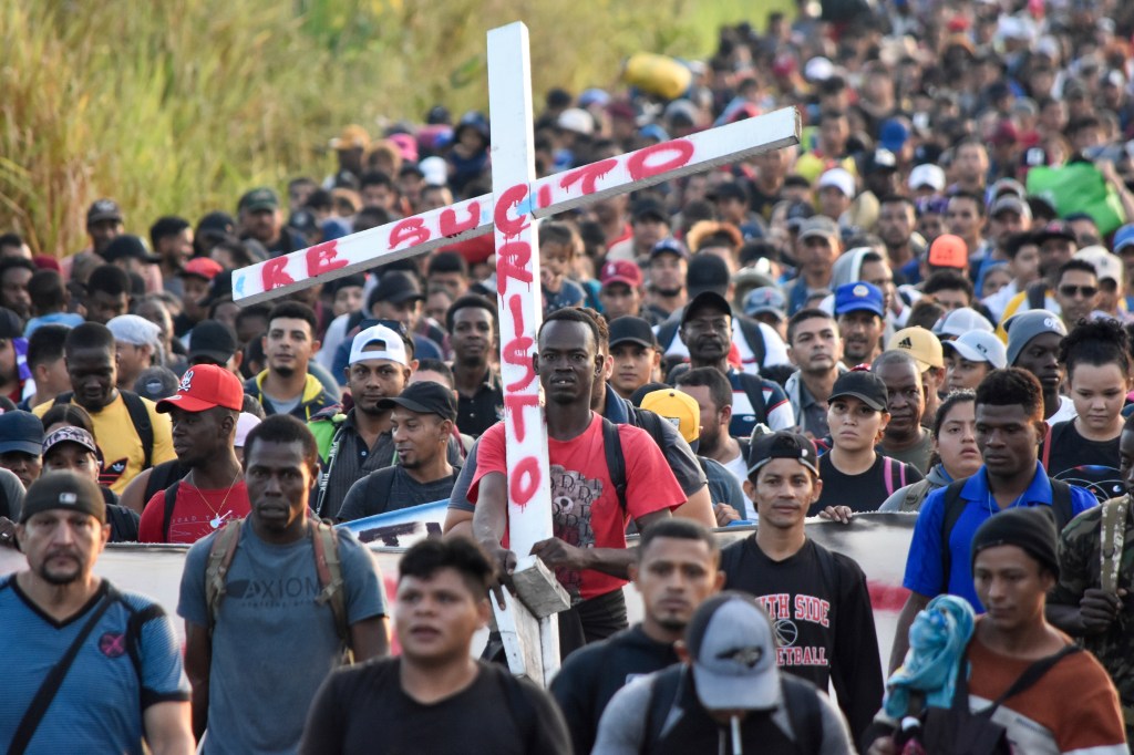 Migrants depart from Tapachula, Mexico, Sunday, Dec. 24.