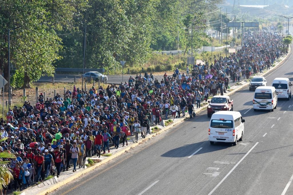 Migrants depart from Tapachula, Mexico, Sunday, Dec. 24.