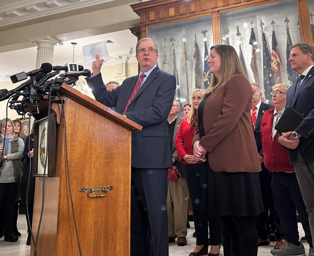 New Hampshire Secretary of State David Scanlan displays a sample ballot on Wednesday, Nov. 15, 2023, in Concord, N.H., while announcing the date of the 2024 presidential primary.