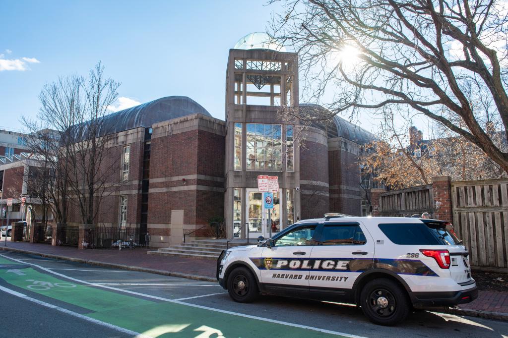A police car stands outside the Jewish student organization Hillel's building at Harvard.