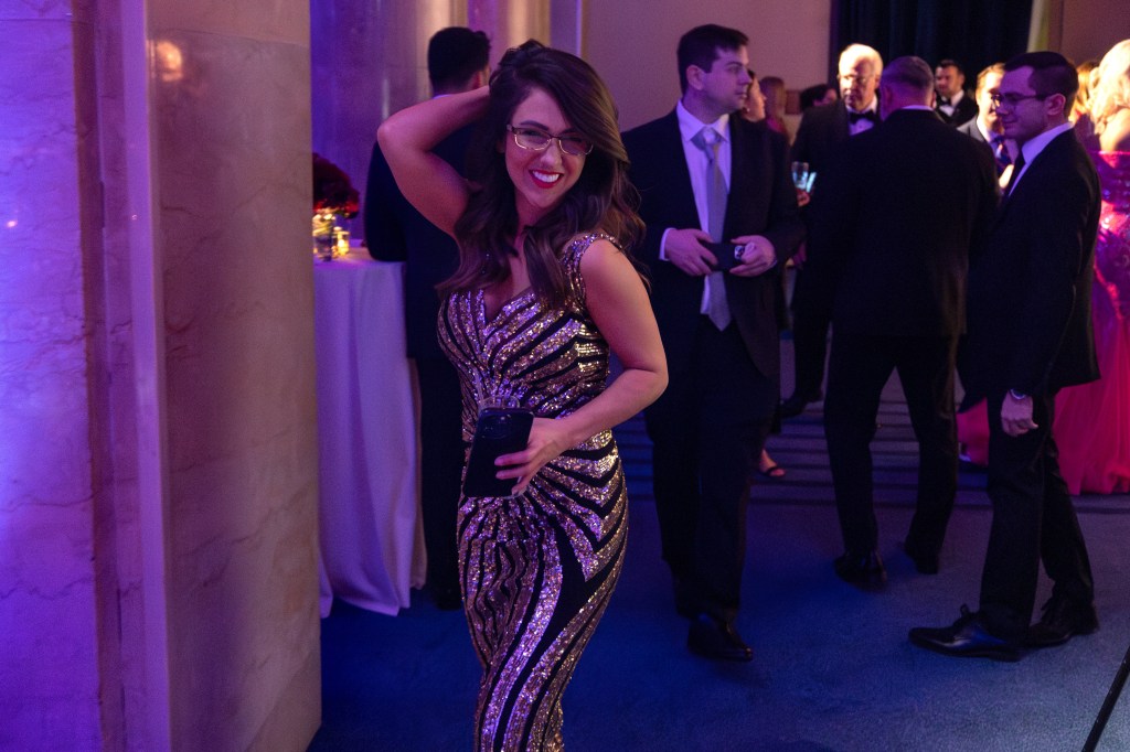 Rep. Lauren Boebert walks through the VIP section before dinner starts at the gala on Saturday night.