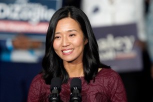 FILE - Boston Mayor Michelle Wu speaks during a campaign rally in support of the statewide Massachusetts Democratic ticket, Wednesday, Nov. 2, 2022, in Boston. Wu, the city’s first mayor of Asian-American descent, is defending her decision to host a holiday party for elected officials of color. (AP Photo/Mary Schwalm, File)